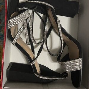 Silver and black heels